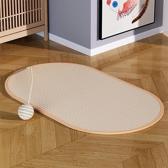 Griffoir chat oval au sol