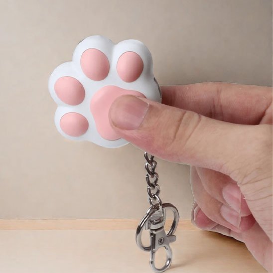 porte cle laser pour chat en forme de patte feline rose